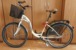 rower damski typu holenderskiego w kolorze beżowym